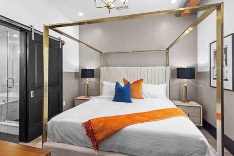 Retreat to the Primary bedroom with a plush king bed, walk-in closet, blackout shades, and a smart TV. Designed for comfort and privacy, this suite is perfect for recharging after a day exploring New Orleans.