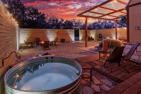 Private hot/cold plunge pool + spa yard at sunset. Fully fenced and completely yours.