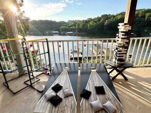 This home has it all! There are games everywhere! On the dock: Enjoy Hook 21  Outside: Play Giant Jenga, Ladder Toss and Corn Hole.  Inside: Have fun with the pool table, Arcade, Xbox, Connect Four and more!