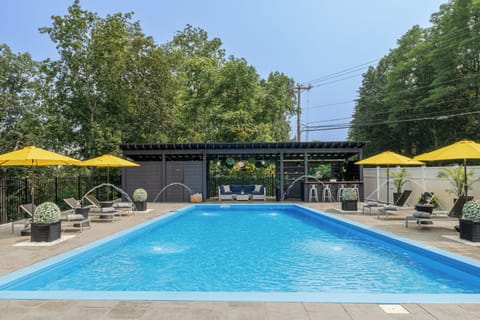 A lounge, bar, and poolside powder room complete the setup for a perfect afternoon.