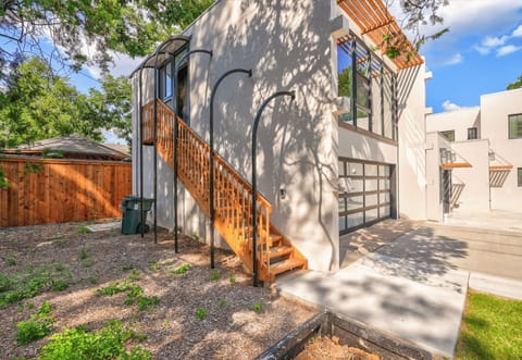 Front exterior and lawn — the well-kept yard guests write to us about
