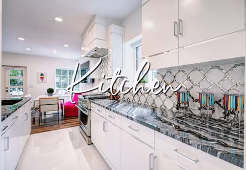 A kitchen that blends modern elegance with practical functionality.
