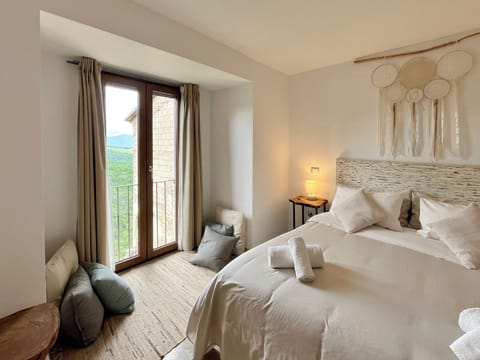 Double Room, Mountain View | Down comforters, individually decorated, individually furnished