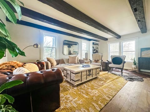 Unwind and reconnect in the living space. Coffee table is filled w/ games!
