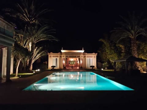 Luxury Suite, Balcony, Pool View | In-room safe, individually decorated, individually furnished, desk