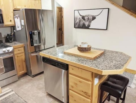 Kitchen with pantry storage around the corner. All basic appliances available!