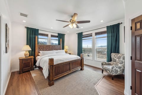 Unwind in the spacious primary suite featuring a king bed, ensuite bathroom, and soft, breathable linens. The perfect private retreat after a full day of adventure.