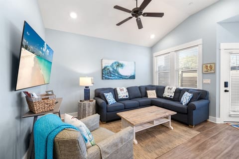 Living room with Smart TV and queen sleeper sofa