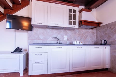 Superior Apartment, Resort View | Private kitchen | Mini-fridge, electric kettle