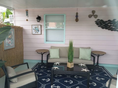 Outside seating area greets you as you enter your private enclosed outside space