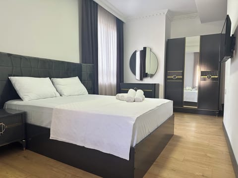 Standard Triple Room, Non Smoking, City View | Laptop workspace, bed sheets