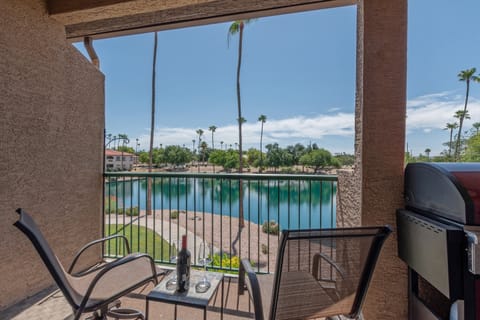 Private balcony offers a stunning view of the community lakes and green spaces.