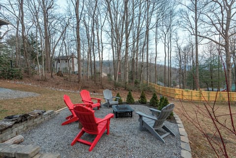 Roast s'mores and swap stories around the fire pit in the backyard.