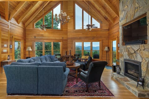 Enjoy stunning floor-to-ceiling mountain views from the living room!