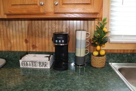 Iced/hot coffee maker. We also have a full pot coffee maker for large groups
