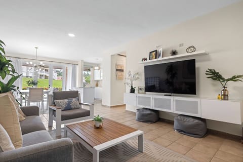 Living room - spacious and comfortable with flat screen TV and ample seating space