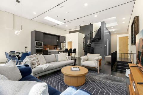 Living Area with Vaulted Ceilings and Open Floor Plan