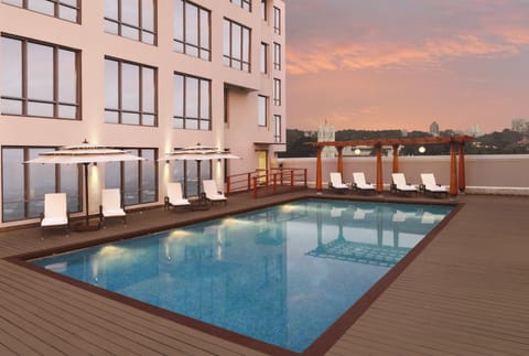 Room, 1 King Bed, Accessible | Pool | Outdoor pool, open 7:00 AM to 10:00 PM, pool umbrellas, sun loungers