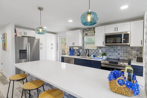 fully stocked kitchen with coffee and tea provided