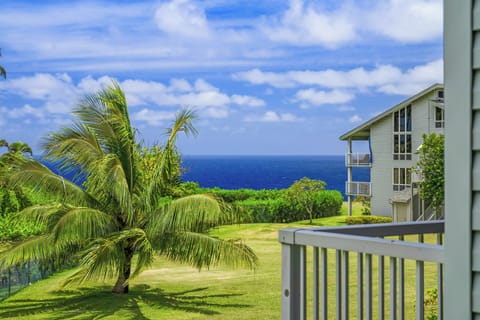 Step onto your private second-floor patio and take in the stunning panoramic views of the sparkling blue ocean.