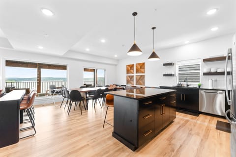 Prepare meals while enjoying lake views—this open kitchen is perfect for gatherings and sunsets.