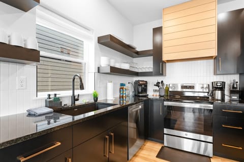 Fuel up at the LUX coffee bar featuring a Philips LatteGo 3200 espresso machine and essentials for a great start.