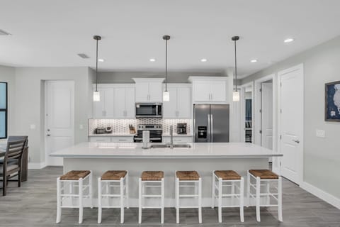 Kitchen with 6 at the bar & 6 at the table.