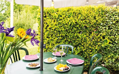 Enjoy reminiscing about your day while sipping a glass of wine outside on the patio.