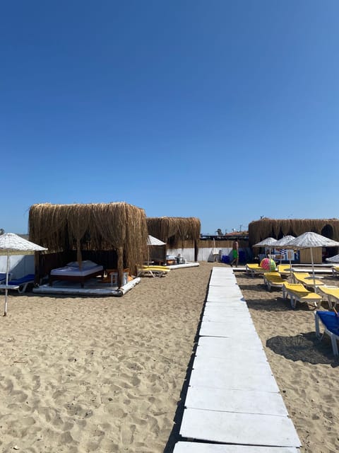 Private beach nearby, sun loungers, beach umbrellas