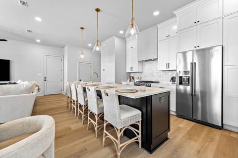 Spectacular lighting, beautiful floors, high-end appliances!