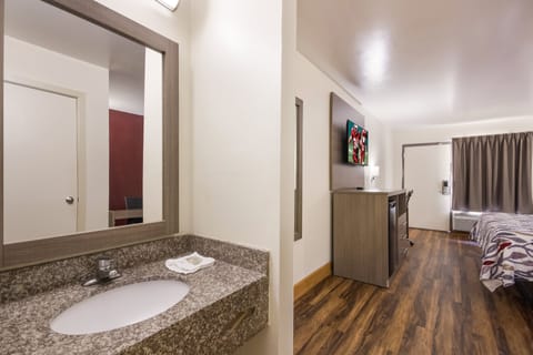 Deluxe Room, 2 Queen Beds, Accessible, Non Smoking | Bathroom | Combined shower/tub, free toiletries, hair dryer, towels