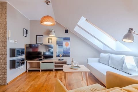 Comfortable Living Room with Sofa Bed and Smart TV | Book Now with RENTUJEMY