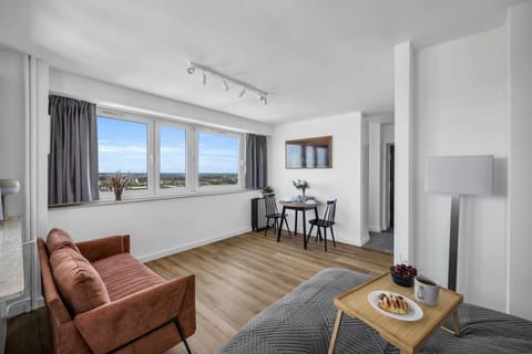 Comfortable Living Room with Sofa Bed and Smart TV | Book Now with RENTUJEMY