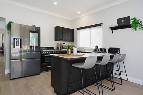Main kitchen, 900 smeg gas top cooking and Samsung family hub fridge