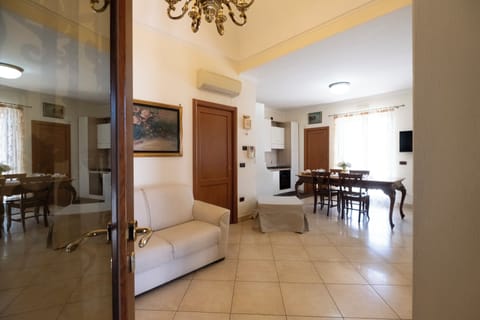 Deluxe Apartment | Living area | 40-inch flat-screen TV with cable channels