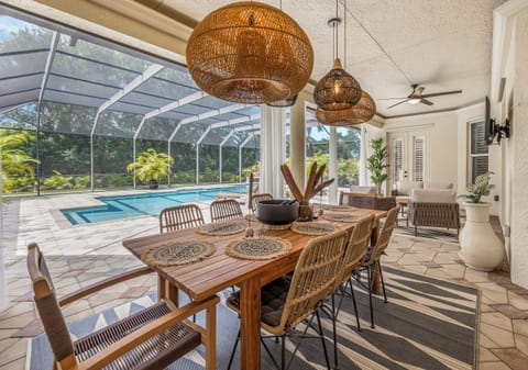 Enjoy lunch or dinner at the  beautiful patio dining table.