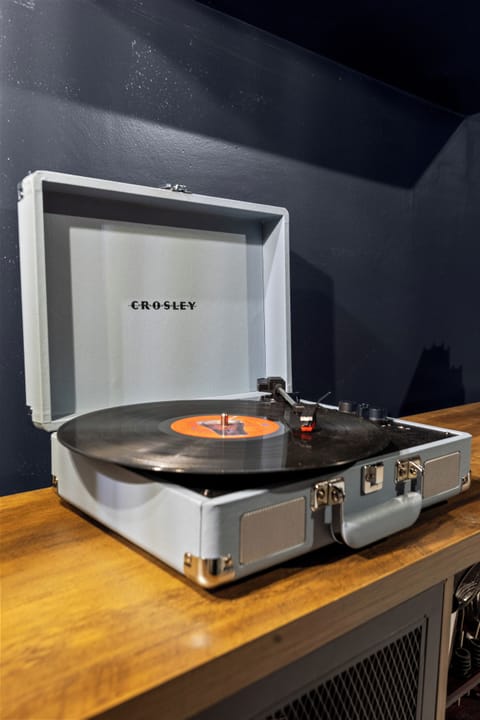 Bring your own vinyl, enjoy ours, or connect your playlist by bluetooth.