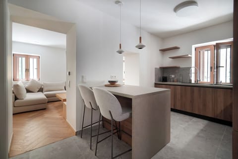 Superior Apartment, Courtyard View | Private kitchen | Full-size fridge, microwave, oven, dishwasher