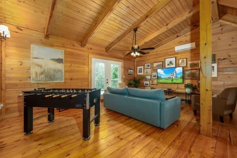 Enjoy foosball or the Nintendo Switch in the upstairs loft with a Smart TV.
