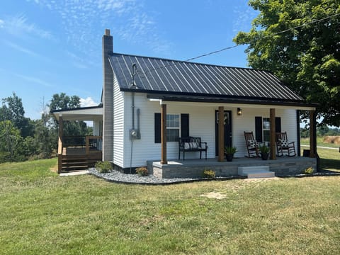 Porch sitting for your morning cup of coffee watching the cattle graze in field