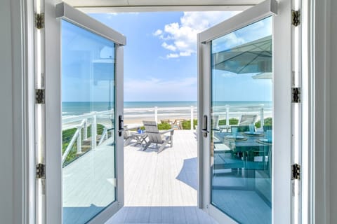 Step outside to experience an amazing sunrise while you sip your morning coffee, you may even see dolphins playing in the surf.