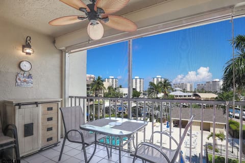 Hello Sunshine...the lovely Santa Maria Harbour Resort Condo 302 has a beautiful view of the pool and canal waters