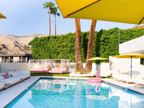 Outdoor pool, open 8:00 AM to 11:00 PM, pool umbrellas, sun loungers