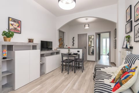 Apartment, Balcony | Living area | 35-inch TV with digital channels