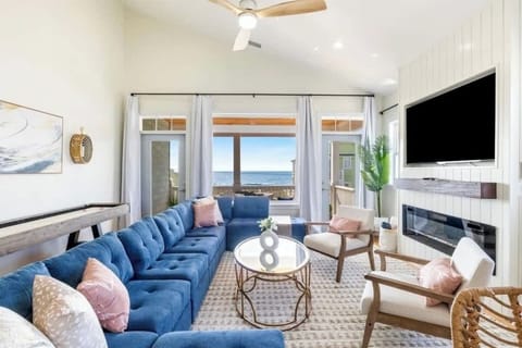 Living room with fireplace & shuffle board table