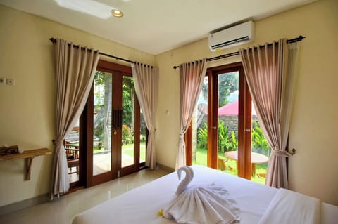 Deluxe Room, Garden View | Garden view