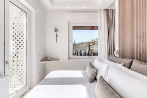 Superior Double Room, Balcony, Courtyard View | In-room safe, soundproofing, iron/ironing board, free WiFi