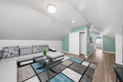 Upstairs Living Room with 75 Inch Samsung 4K TV, Dolby Atmos Surround Sound