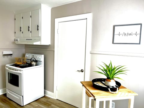 Door leads into storage area for your groceries 