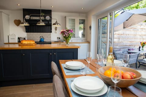 Large patio doors leading from the kitchen to the patio